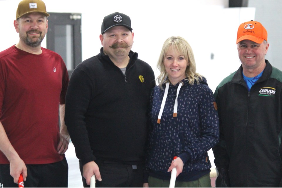 The Rick Phillips Jr. rink recently won the A event at the Didsbury Curling Club’s open bonspiel season finale. From left: Vaughn Luft, second; Chris Dussault, lead; Nicole Dussault, third; and Rick Phillips Jr., skip. 
Submitted photo