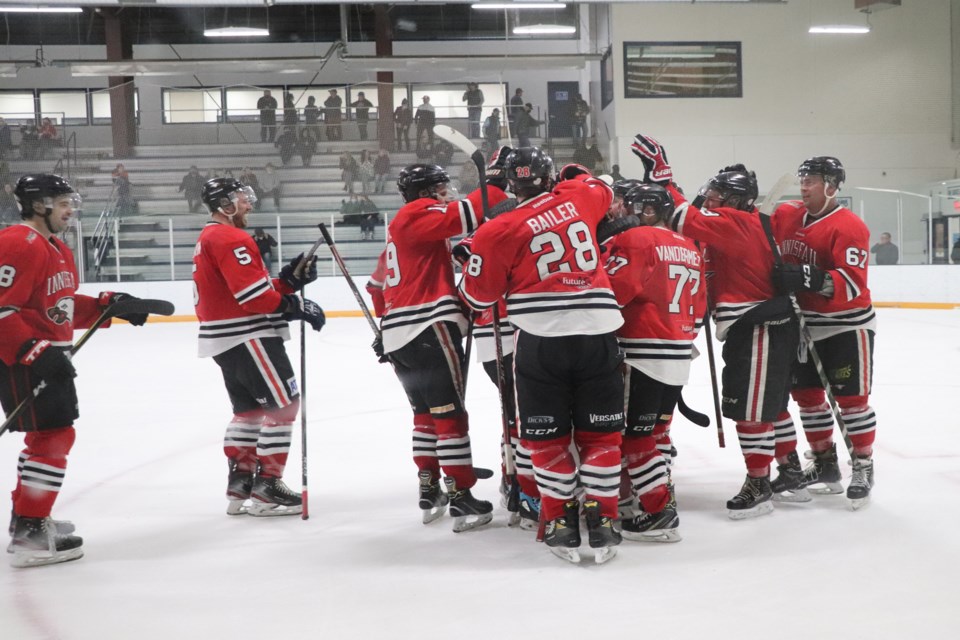 The Innisfail Eagles mob emergency back-up goalie Jason Reckseidler after he shut down the opposing Nanton Palominos in a shootout to give the team a hard fought 6 - 5 victory on Jan. 15. Johnnie Bachusky/MVP Staff