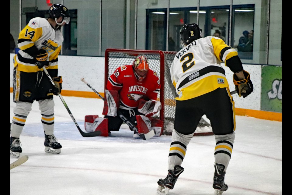 Innisfail goalie Wade Waters shuts down a Devon attack in the first period. Waters faced 32 Barons shots for his team's 6 - 4 victory on Feb. 9. Johnnie Bachusky/MVP Staff