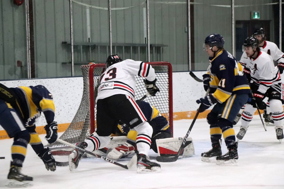 Innisfail's Parker Smyth crams the Stony Plain net during another attack. Smyth scored the only goal of the game; a 1 - 0 victory against the Stony Plain Eagles.
Johnnie Bachusky/MVP Staff