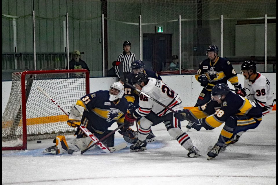 The Innisfail Eagles' Vince Connon (centre) ties the game at 6 – 6 with just 1:27 left in regulation during the season and home opening Chinook Hockey League game against Stony Plain in Innisfail on Oct. 21. Johnnie Bachusky/MVP Staff