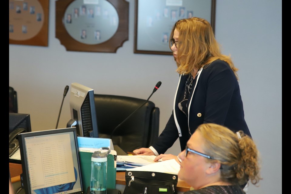 Olds development officer Shari Edginton outlines the Mountain View Emergency Shelter Society’s development permit application for an emergency shelter during Olds town council’s March 25 meeting.