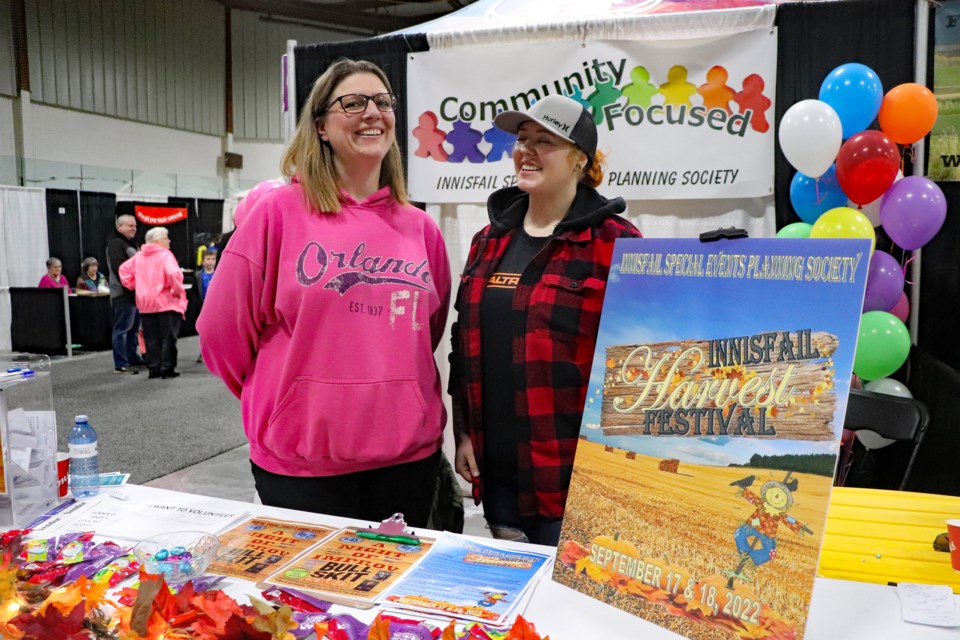 Jamie Flaman, vice-president of the newly created Innisfail Special Events Planning Society, (left) and society member Nicole Jacobson, at their display booth during the 2022 Spring Trade Show on April 2. The pair were at the trade show promoting the society's upcoming inaugural Harvest Festival that is scheduled for Sept. 17 and 18 at Centennial Park. Johnnie Bachusky/MVP Staff