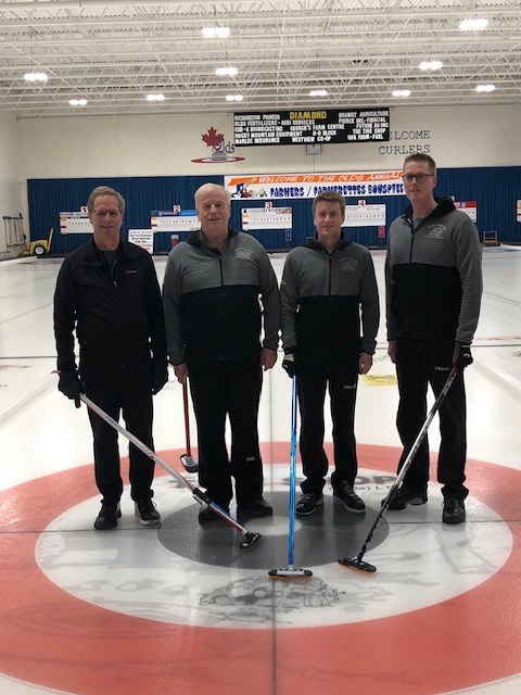 The Adam Winter/George’s Farm Centre Ltd. rink won the A side of the Olds Farmers bonspiel last weekend. From left are Roy McArthur- Future Ag Inc., Brian Winter, Aaron Winter and Adam Winter.