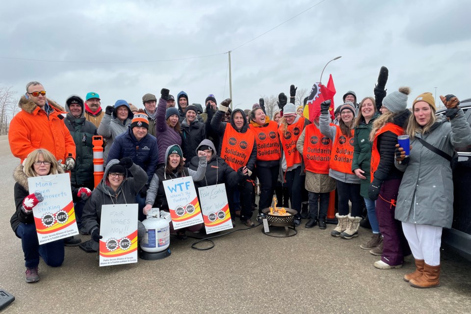 Striking workers gather outside the Bowden Institution on April 21 to demonstrate their solidarity for a new and improved collective agreement with the federal government. Johnnie Bachusky/MVP Staff