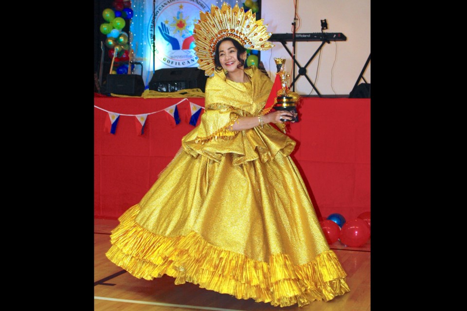 The Sundre Filipino community’s own Irene Monleon, who works at the Sundre Seniors’ Supportive Living centre, was among some dancers who donned traditional garb during their performance at an inaugural event held on Saturday, May 31 at the Sundre Community Centre. Simon Ducatel/MVP Staff
