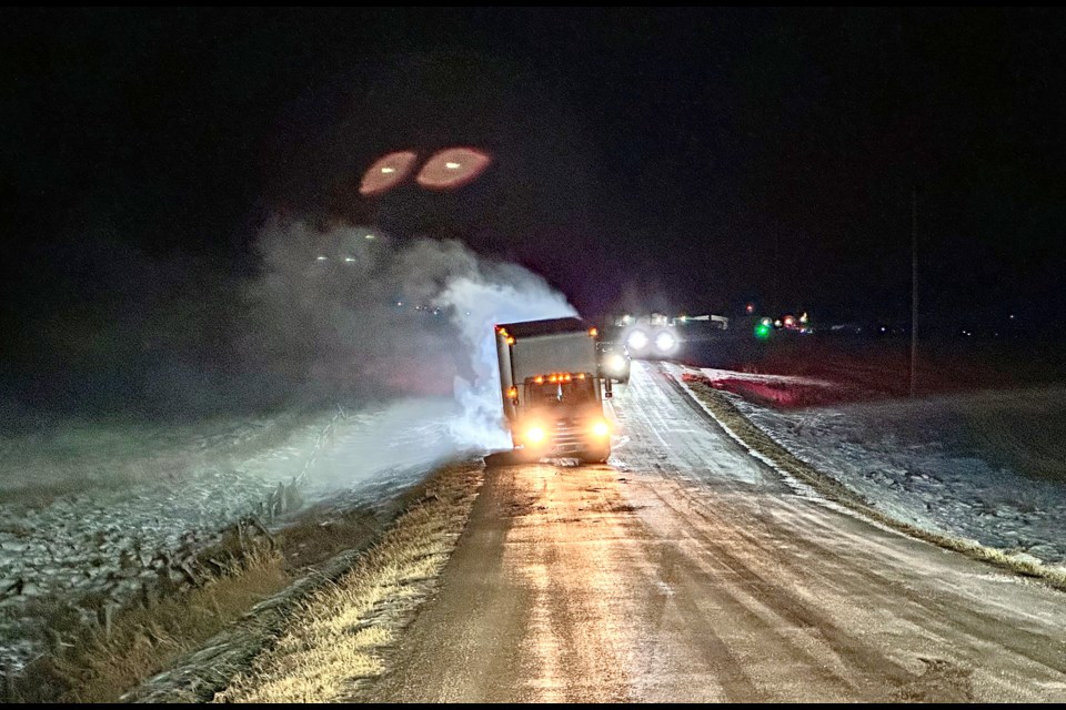 The stolen mail truck from Olds on a rural road during the RCMP pursuit of the culprit late in the evening on Dec. 20. RCMP photo