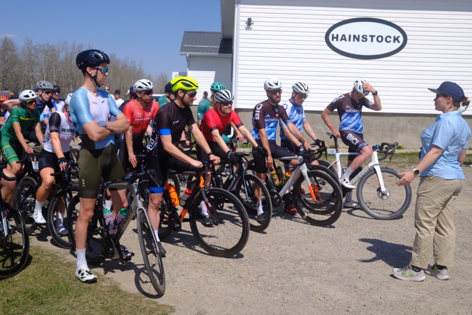 The Hay City Road Race’s category 4 men get briefed on Saturday, May 3 at the staging area set up northwest of Olds at the Hainstock Community Hall. 
Photo courtesy of Felix Lee 