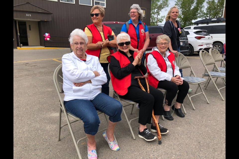 These ladies had front-row seats to watch the parade, which started and ended at the Memorial Park.
Dan Singleton/MVP Staff