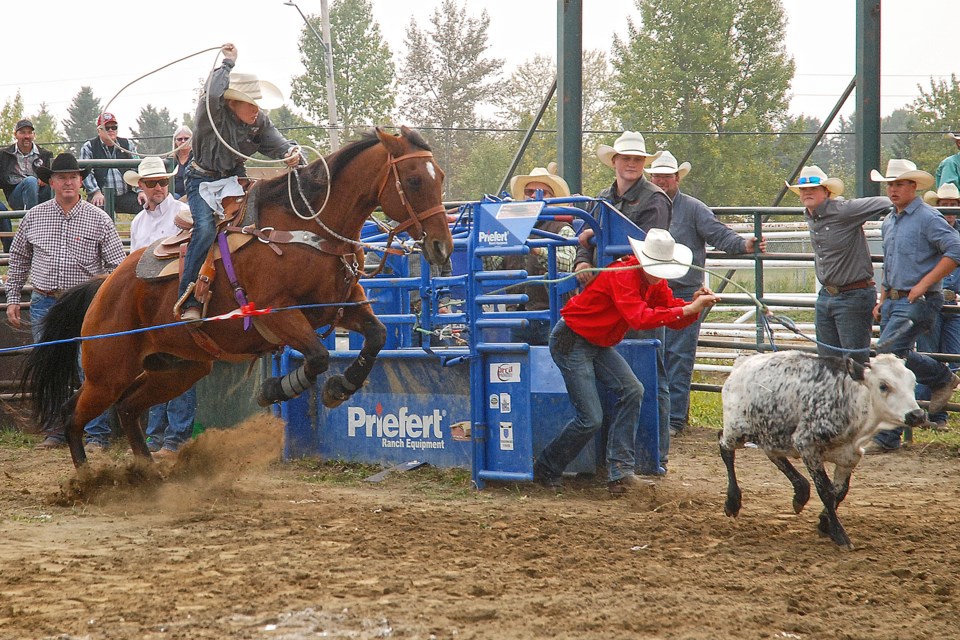 Sundre's own Cole Evans comes leaping out on his steed Friday afternoon during the junior breakaway boys event of a high school rodeo hosted at the Sundre Rodeo Grounds by the Mountain View High School Rodeo Club. A 10 second penalty coming out of the gate landed him a total time of 17 seconds.
Simon Ducatel/MVP Staff