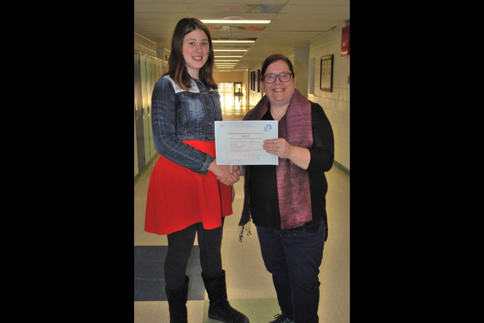 Grade 9 student Arianna Weibe received the DELF Certificate from Lisa Weiss, the French immersion tearcher at Innisfail Schools Campus. Missing is award winner Grade 9 student Joseph Kelly. Photo by Karen Fagan