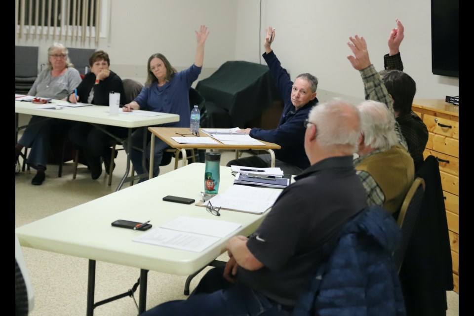 From left, Bowden MPC commissioners Marie Flowers, Paul Webb, Randy Brown and Wayne Milaney vote in favour of the application. 