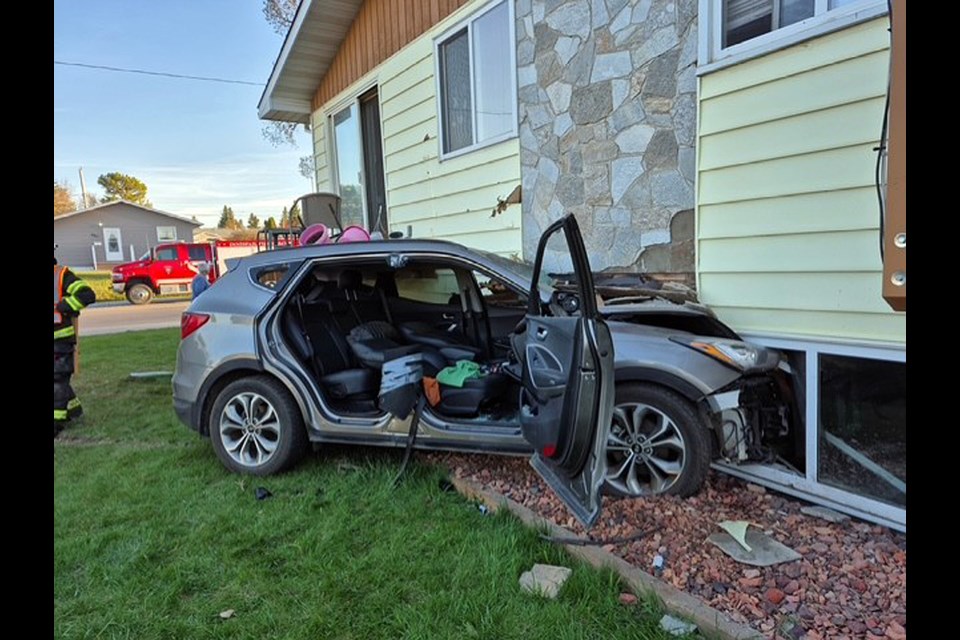 The extensively damaged vehicle that crashed into the ground level of a duplex in Innisfail at about 8 p.m. on May 1. Submitted photo