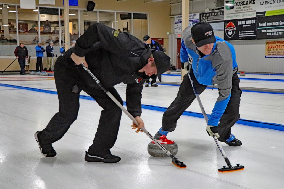 The 128 total Innisfail and area curlers who participated in the 75th annual Innisfail Farmer/Farmerette Bonspiel each paid a $60 entry fee, which entitled them to have four breakfasts, four lunches, three suppers, a chance at prizes, a minimum of four games, and entry to the bonspiel-ending banquet on Jan. 21.
 Johnnie Bachusky/MVP Staff