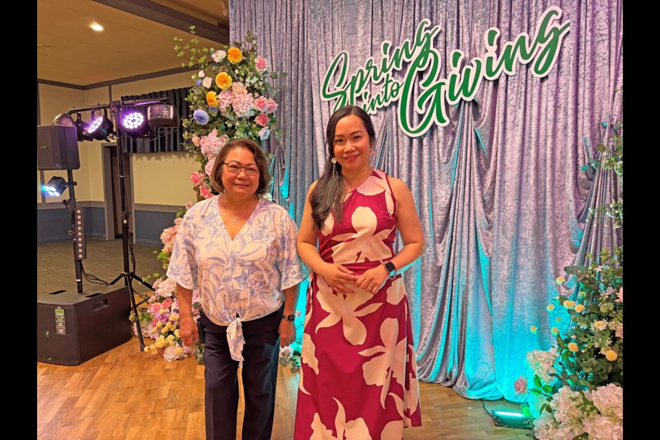 Grace Gresos, president of the Phil-Can Neighbourhood Association (left), and Belle Danao, the association’s treasurer, at the Spring into Giving fundraiser event on May 31 at the Innisfail Royal Canadian Legion Branch #104. This year's fundraising goal was to puirchase up to 20 wheelchairs for citizens of the Philippines. Johnnie Bachusky/MVP Staff