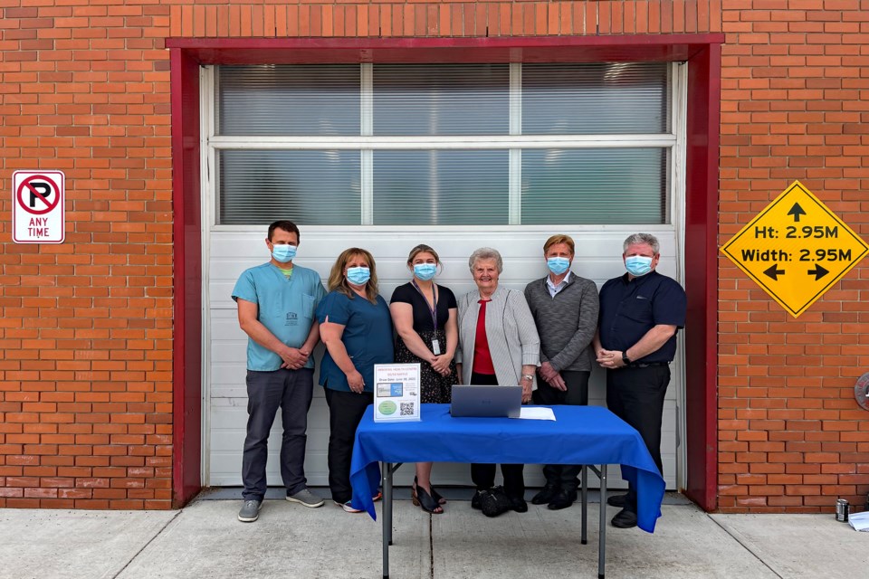A group of staff, volunteers and supporters from the Innisfail Health Centre for the Ambulance Bay Upgrade Project. Standing left to right in front of the ambulance bay are Dr. Jesse Christiansen, Leslie-Ann Epp, Jacey Brownlee, Rose Winters, Jeff Hammel and John Barry. Johnnie Bachusky/MVP Staff