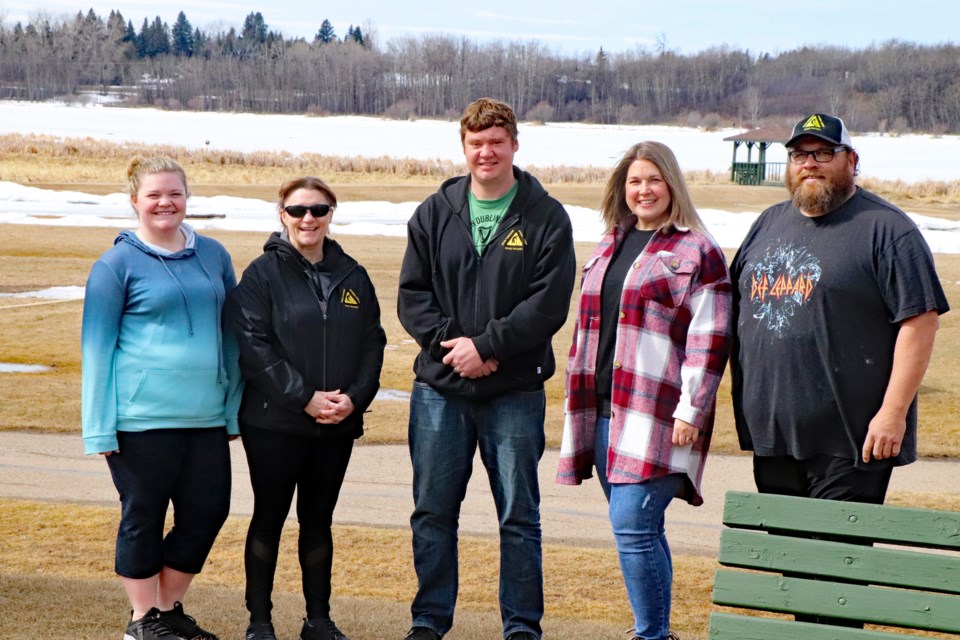 Members of the organizing committee for the upcoming 25th Annual Dean Turnquist Spring Fever Road Hockey Tournament gathered last weekend at Centennial Park. From left to right is Jasmine Thompson, Darlene Thompson, Riley Gleiser, Nicole Pillman and Dean Turnquist. The tournament is being held April 9 and 10 at the Innisfail Arena. Johnnie Bachusky/MVP Staff