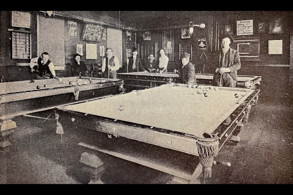 The inside of Thorne's Pool Hall in 1916. This building was built originally by Fred E. Fawdrey and J. T. Rogers in 1903. The upstairs of the pool hall held the offices of  Dr. Membry and Dr. Carter, the first dentists in Innisfail. Historical photo courtesy of Sheri Griffith.
