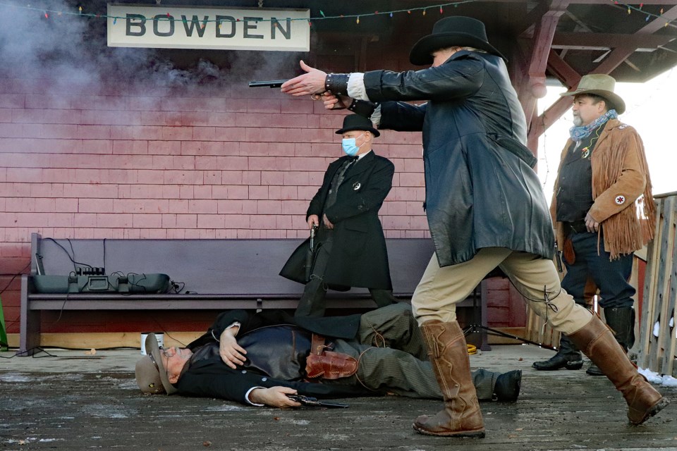 Hundreds of attendees at Snow & Tumbleweeds: A celebration of Winter in the Prairies were thrilled with the performance of actors from the Guns of the Golden West Association who gave hourly performances of their mock gun fights on the platform of the old Bowden train station at the Innisfail and District Historical Village on Jan. 15.  Johnnie Bachusky/MVP Staff