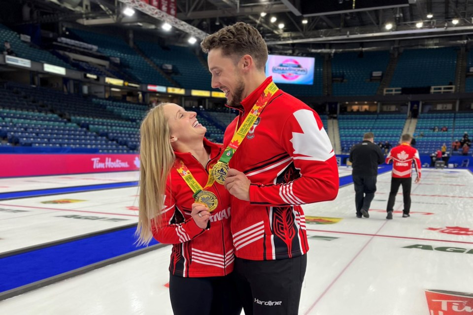 Jocelyn Peterman and Brett Gallant share a special and victorious moment late last month in Saskatoon after each of their curling teams won the right to represent Canada at the Beijing Olympic Winter Games in February. 
Curling Canada photo