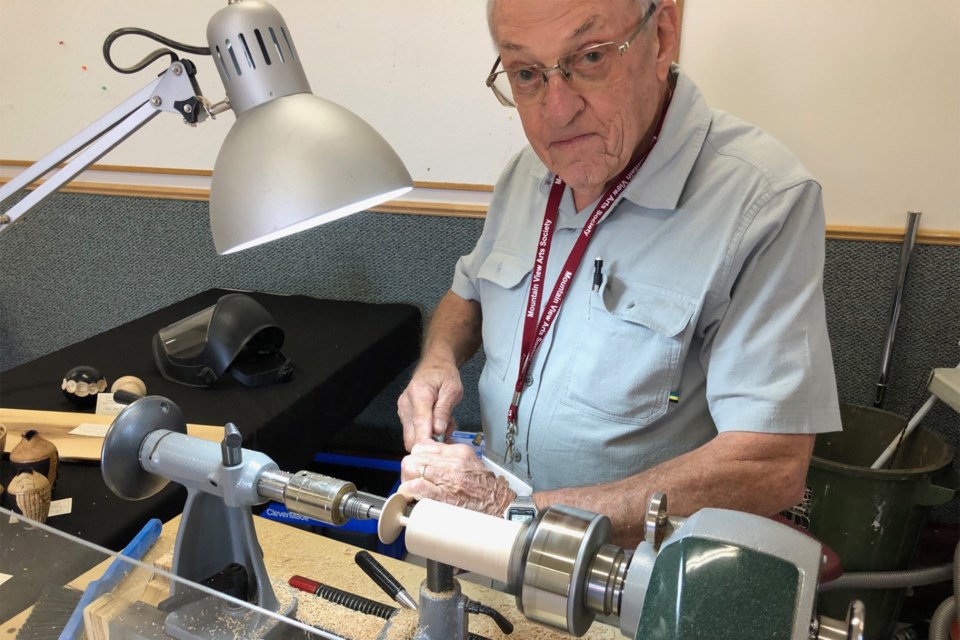 John Smythe from Olds creates a spinning top on a lathe in the Didsbury Train Station during the Mountain View Arts Festival held Sept. 15 - 17.
Dan Singleton/MVP Staff