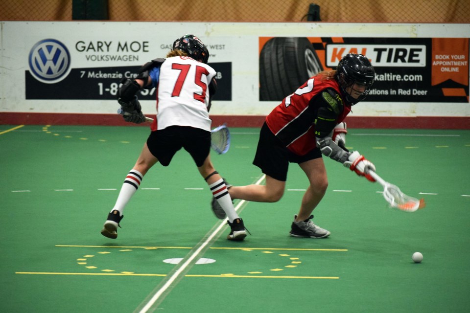 Ruckus players Mabel Weddell, left, and Presley Lauscher at practice in Red Deer on April 20. 
Submitted photo