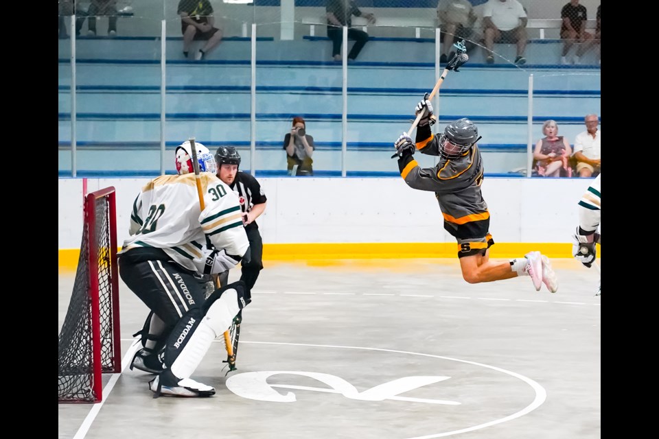 Innisfail’s Graeson Amundson jumps to take a shot for a Mavericks’ scoring chance during the Junior B lacrosse provincial gold medal game against the Calgary Shamrocks in Fort Saskatchewan on Aug. 4. The Mavericks of Innisfail won the game and are now going to the national Founders Cup championship series. Sarah Sarich/Goat Sports Photography