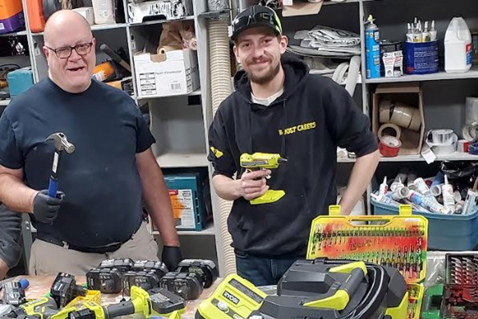 Charles Silk (left) and fellow Men's Shed, Innisfail member Jesse Thomas get ready to create and serve. Submitted photo