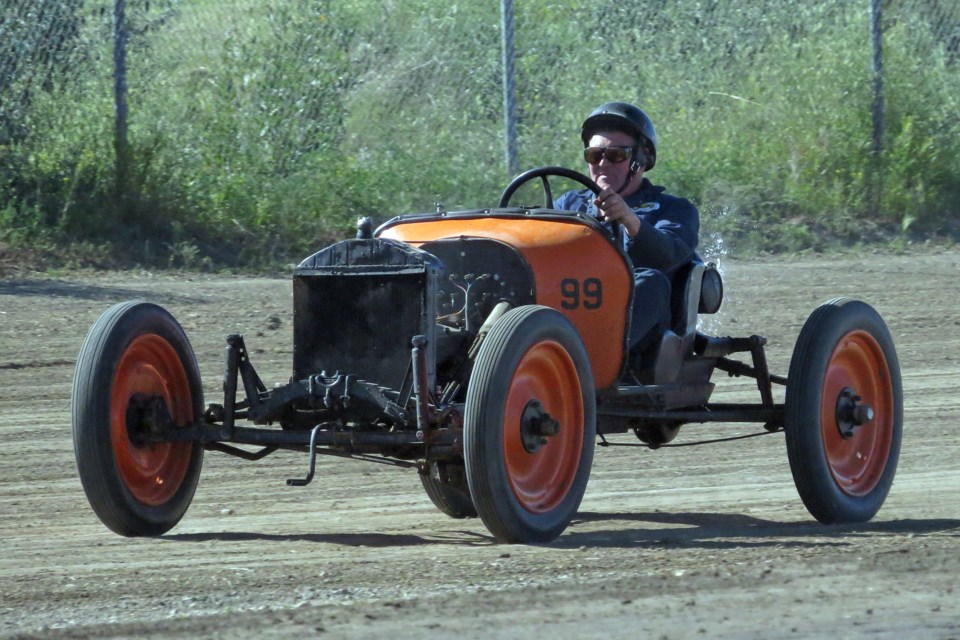 Paddy Munro races his vintage Model T classic at the Dinosaur Downs Speedway dirt track in Drumheller.
Photo courtesy of Carol Douglas