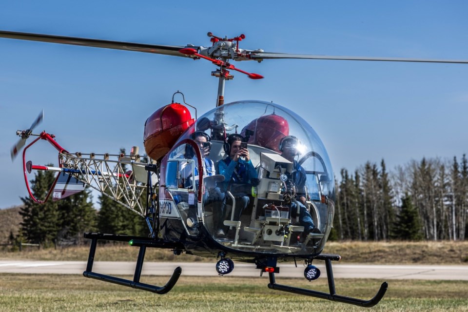 This Bell 47 helicopter, owned by Glen Chong who is a member of the Innisfail Flying Club, was among 31 visiting aircraft including plenty of planes that touched down at the Sundre Airport on Sunday, May 11 for the Sundre Flying Club’s annual Mother’s Day Fly-in Breakfast.
Photo courtesy of “B” Squared Photography