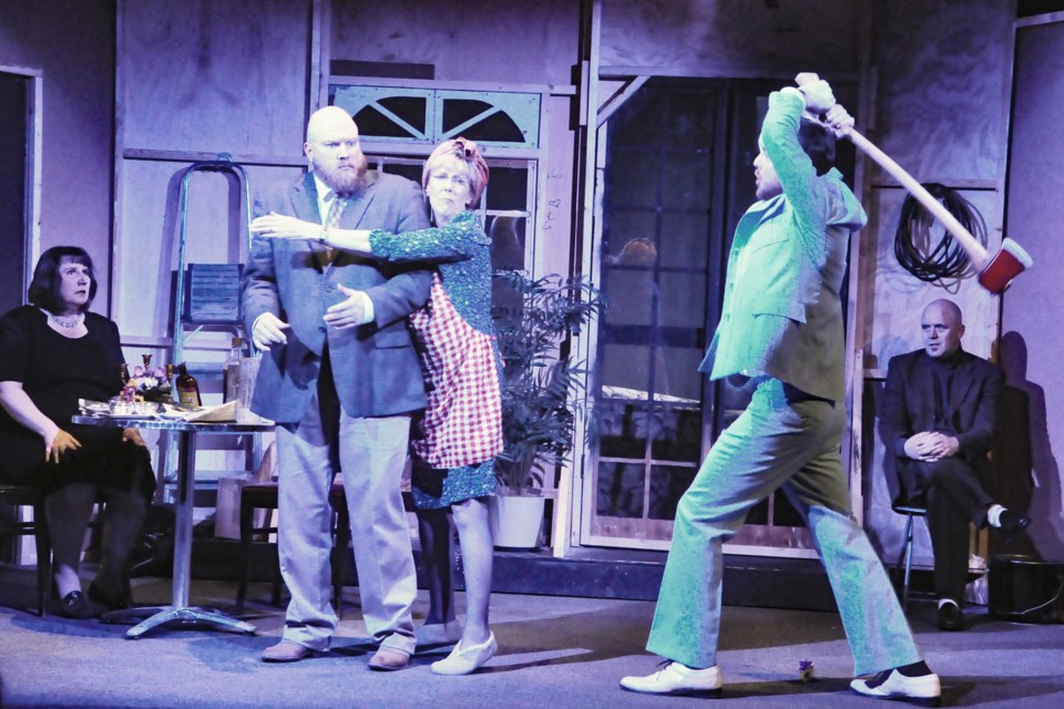 The comical madness of Michael's Frayn's Noises Off as portrayed by Innisfail Town Theatre's production included characters with axes, along with every type of dysfunction an audience could imagine. Photo by Jim Carroll