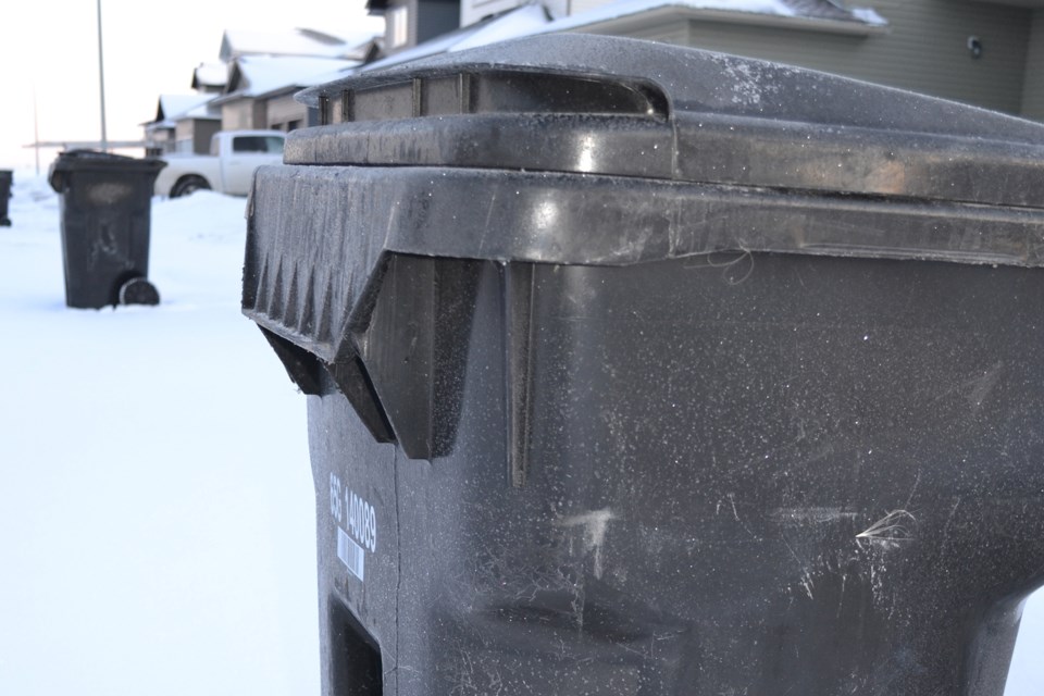 MVT Olds black garbage bin