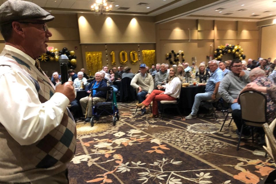 Banquet MC Ken Weseen speaks to guests during Saturday's centennial celebration.
