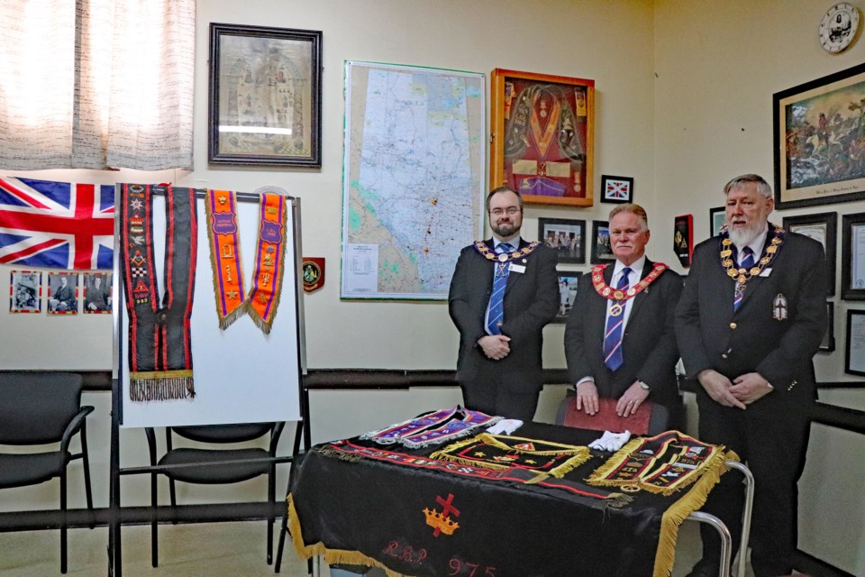 Leading Orangemen recently gathered at Innisfail's John Coburn Memorial Lodge #3287 for an open house to chat with community members about the service club, including its long history serving Innisfail. From left to right is Murray Penney, county of Alberta chair; Ron Murphy, grand master of the Grand Orange Lodge of Western Canada and past master of the Innisfail lodge, and Billy Naismith, with the county of Alberta and treasurer of the Innisfail lodge. Johnnie Bachusky/MVP Staff
