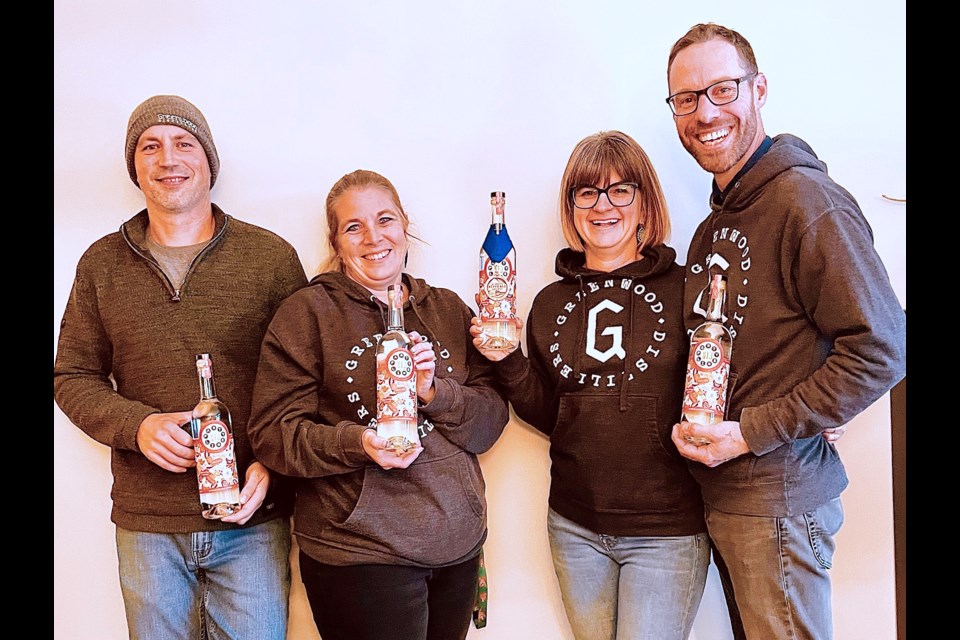 From left: Dan and Dallas Groom partnered up with Bronwyn and Owen Petersen – all from Sundre – to launch Greenwood Distilleries in 2019. Their Roundabout Gin earned accolades at the 2021 Alberta Beverage Awards under the Judges Selection category, and more recently, their Party Lin Gin won Best in Class at the 2023 Alberta Beverage Awards. Owen heaped praise and gave credit to Dan for conjuring up the award-winning concoctions whose ingredients include locally-grown and harvested botanicals like dandelion roots. “He’s made two gin recipes for us and both have been award winning. He’s got a pretty great palate and gin recipe designing ability,” Petersen said about his business partner.  
Photo courtesy of Liat Petersen