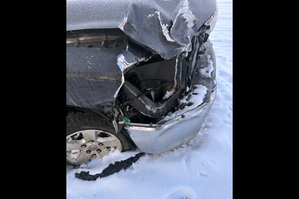 A photo of the damaged front end of Sheryl Knock's 2012 Dodge Ram 1500 pickup truck during a March 25 visit to an Olds recovery yard. Knock's vehicle is considered a write-off. Submitted photo