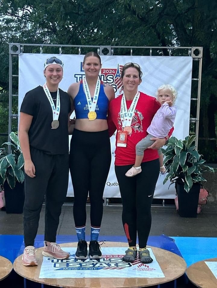 mvt-rachel-andres-and-folks-on-podium