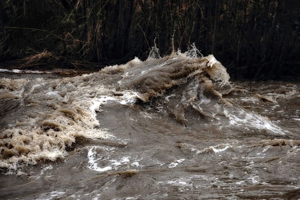 Kevin Heerema, Sundre's director of emergency management, said that fast-flowing streams have the potential to sweep the feet from underneath an adult even if the water level is below the knees. 
Photo courtesy of Lance Ghostkeeper