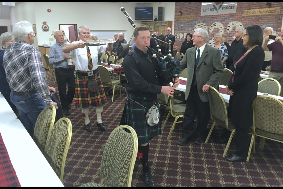 Piper Dale McIntyre leads the ceremonial march of the haggis, dutifully carried by John Foster, who was followed immediately by whiskey bearer Tom Reap, during the Royal Canadian Legion Sundre Branch #223's Robbie Burns Day Social on Saturday, Jan. 21.
Simon Ducatel/MVP Staff