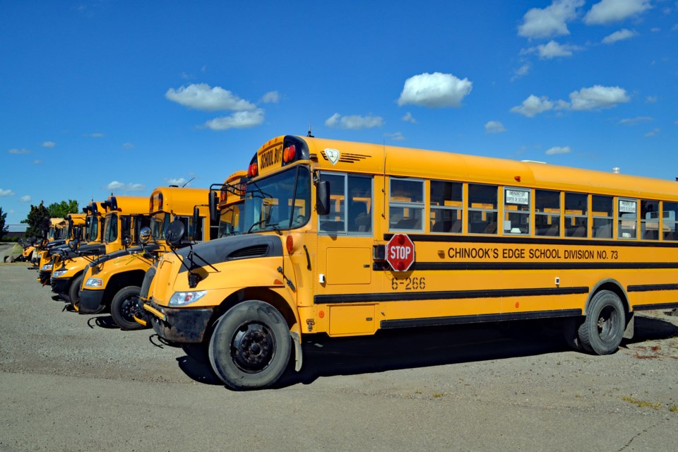 A row of Chinook's Edge School Division buses. The school division is having a challenging time finding enough regular and spare drivers for its 84 bus routes. Doug Collie/MVP Staff