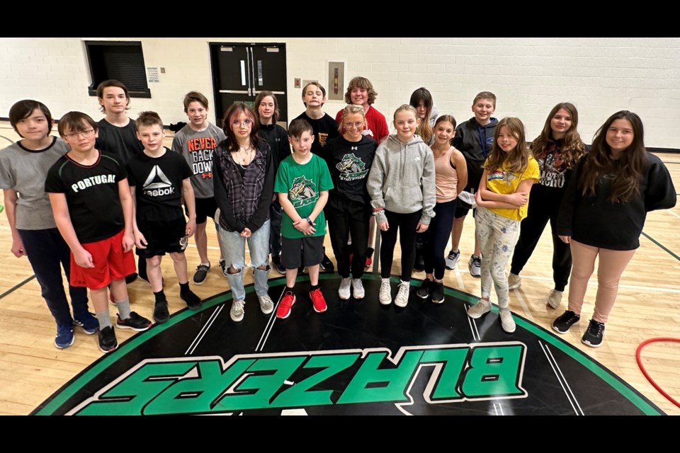 Edwin Parr Award nominee Amy Severtson centre, poses with one of her classes at Bowden Grandview School. 
