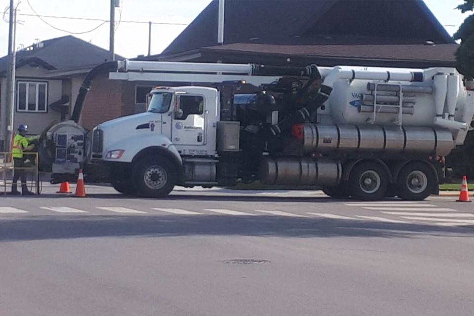 MVT sewer truck manhole