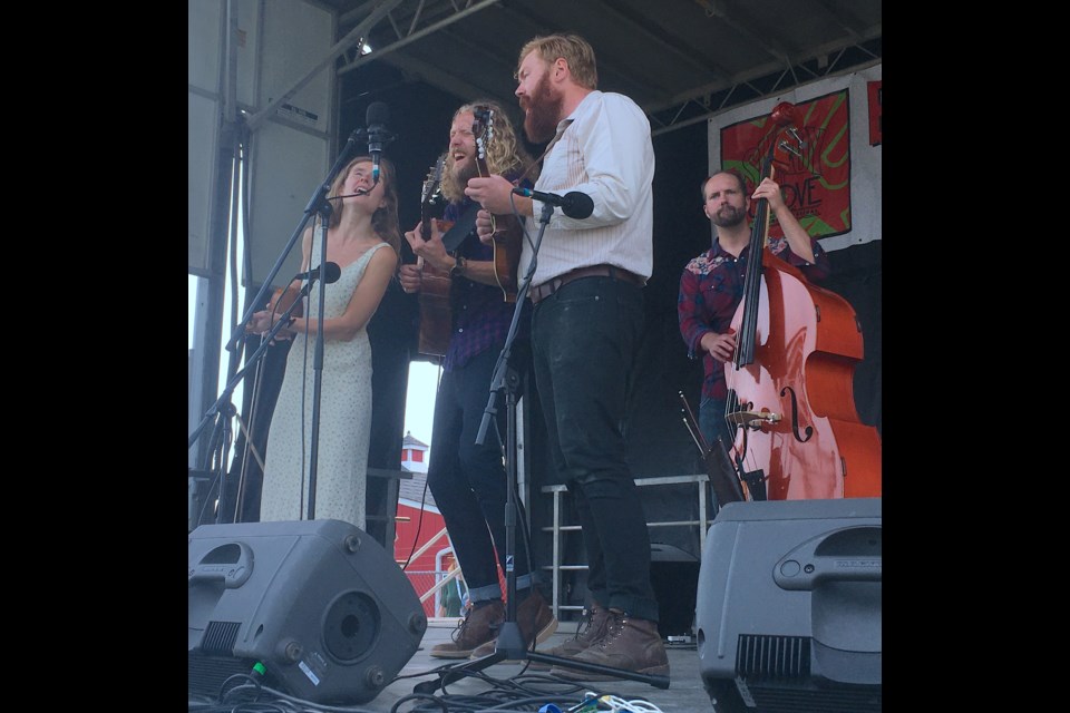 B.C.-based band Under the Rocks – from left: Chloe Davidson on the fiddle, Jordan Klassen on guitar, Chris Baxter on the mandolin, and Nils Loewen on Bass – took to the stage during the Saturday afternoon performances. They were among an all-Canadian lineup on the docket for this year’s Shady Grove Bluegrass Music Festival, which ran July 14-16.  
Simon Ducatel/MVP Staff