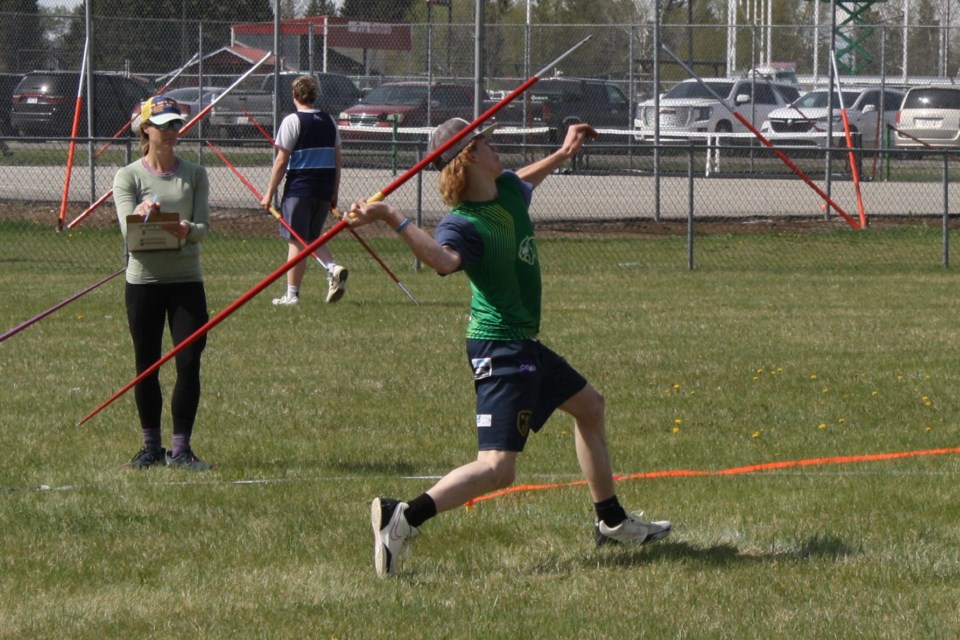Grade 11 student Luke Coleman, who was among a contingent of Cremona Cougars that came out, prepares to throw in the intermediate boys’ javelin category. 
Simon Ducatel/MVP Staff