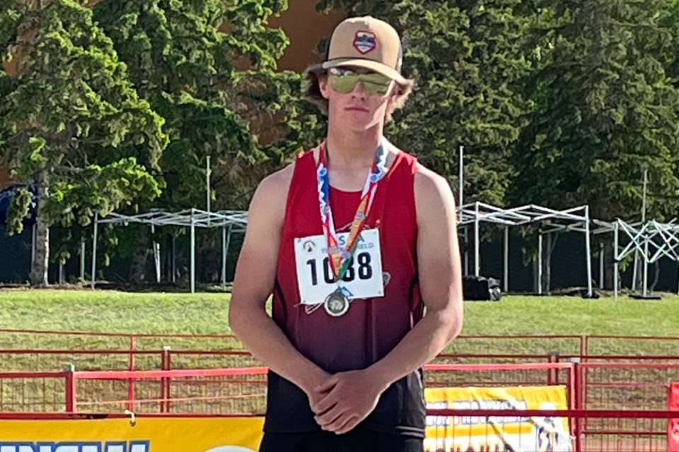 Haydyn Scott’s efforts at the Alberta Schools’ Athletic Association’s Track and Field Championships meet in Edmonton on June 7-8 earned him a silver medal in the junior men’s pole vault category. 
Courtesy of Sundre High School