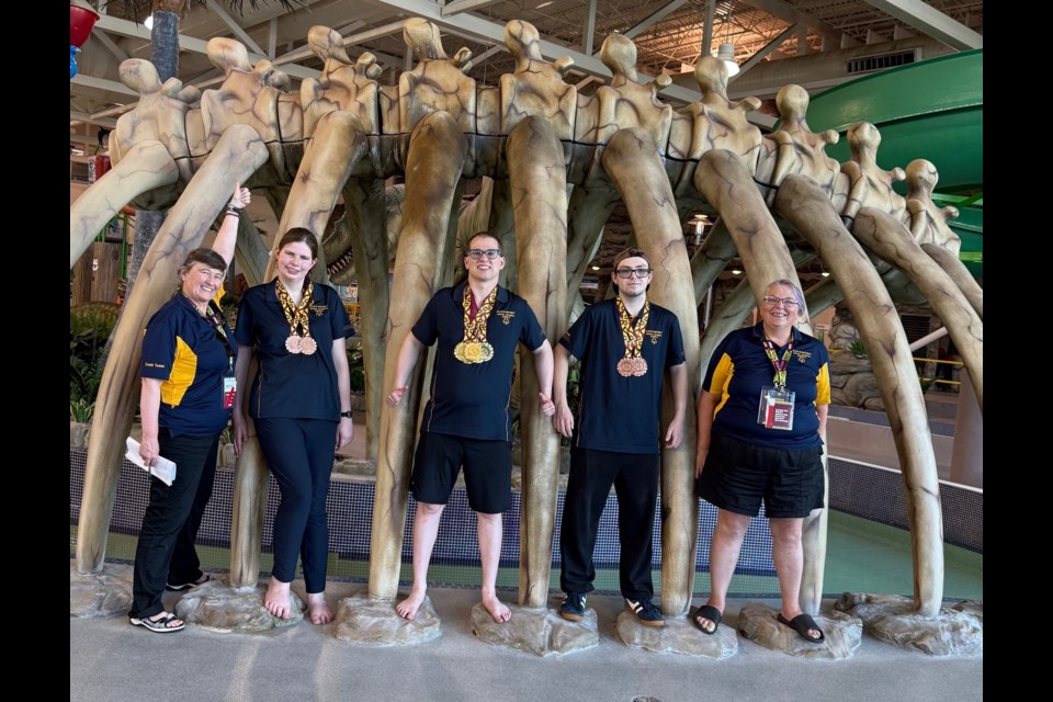 Members of the  Special Olympics Olds & District pose with their medals.
Photo submitted