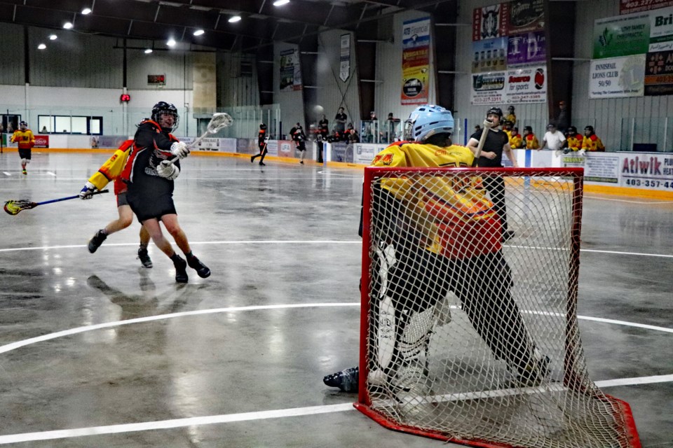 The Innisfail Phantoms make a spirited attack on the Bonnyville Heat's net during afternoon 16U action on May 28 during the second day of the 14th annual Spirit of the Sticks tournament at the Innisfail Twin Arena. Johnnie Bachusky/MVP Staff