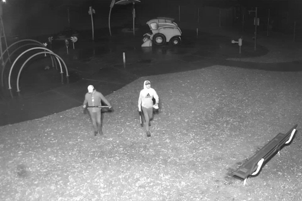 The two vandalism suspects can be seen leaving the Olds Splash Park.
Photo courtesy of Olds RCMP