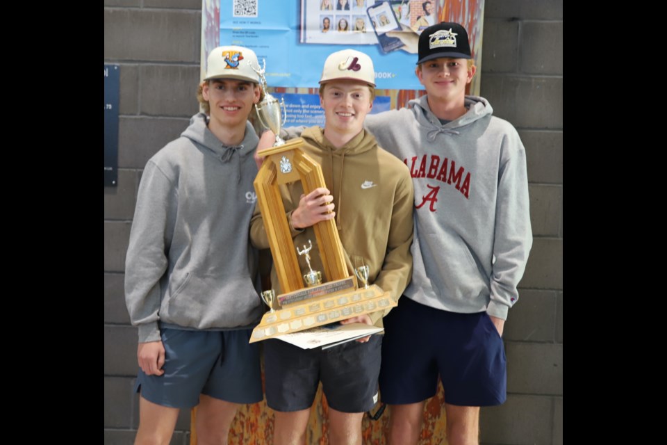 Ecole Olds High School Senior Male Athlete of the Year Drew Bohnet (centre) poses with the award, flanked by two runners-up: Dane Drent (left) Liam Hartt.
Senior Female Athlete of the Year Unfortunately, Senior Female Athlete of the Year Sharlese Weigum was not present to receive her trophy.
