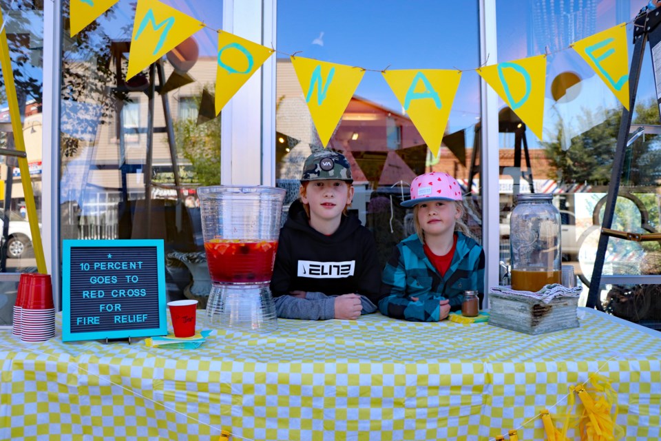 Sullivan Robin, 9, and his seven-year-old sister Nona, right, are giving 10 per cent of their earnings from Lemonade Day to help fire victims in British Columbia. 
Johnnie Bachusky/MVP Staff